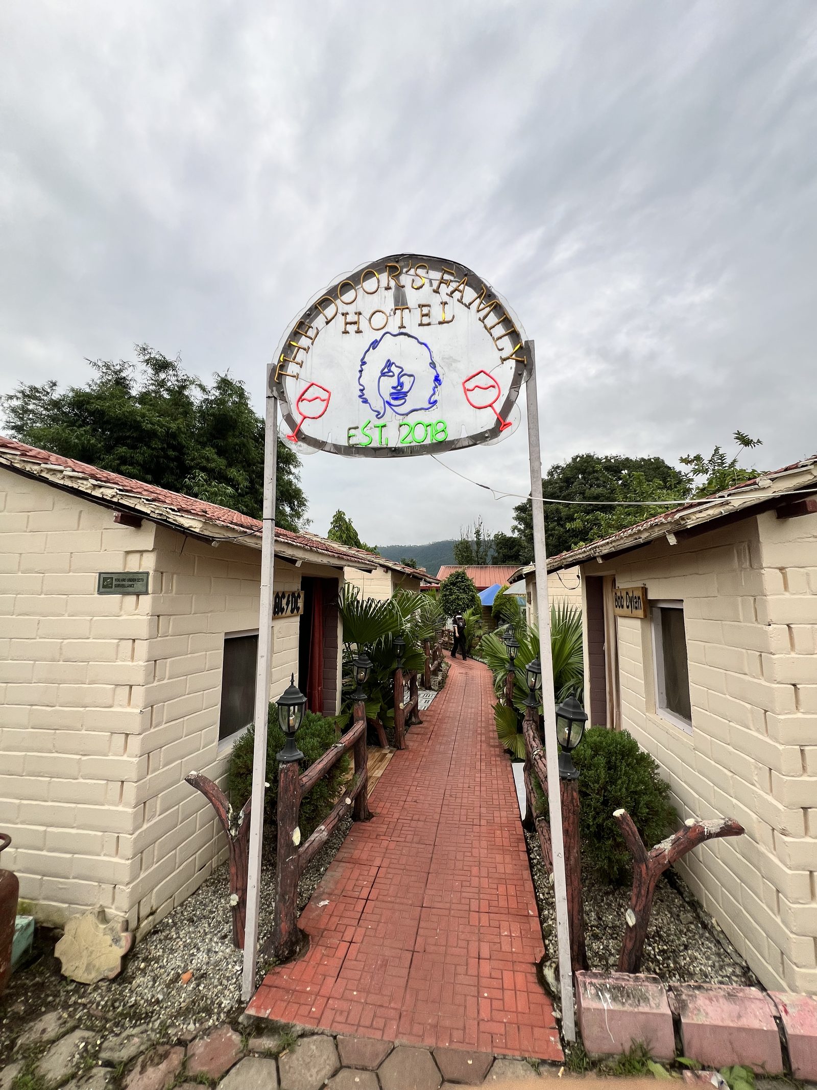 Garden entrance with cottages at The Door's Family Hotel